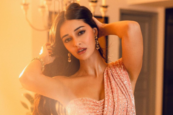 When Ananya Panday eats sticky mango rice for the first time, she encourages her followers not to "overreact."